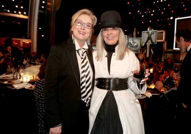 Note the glass of wine. (Image via Getty)